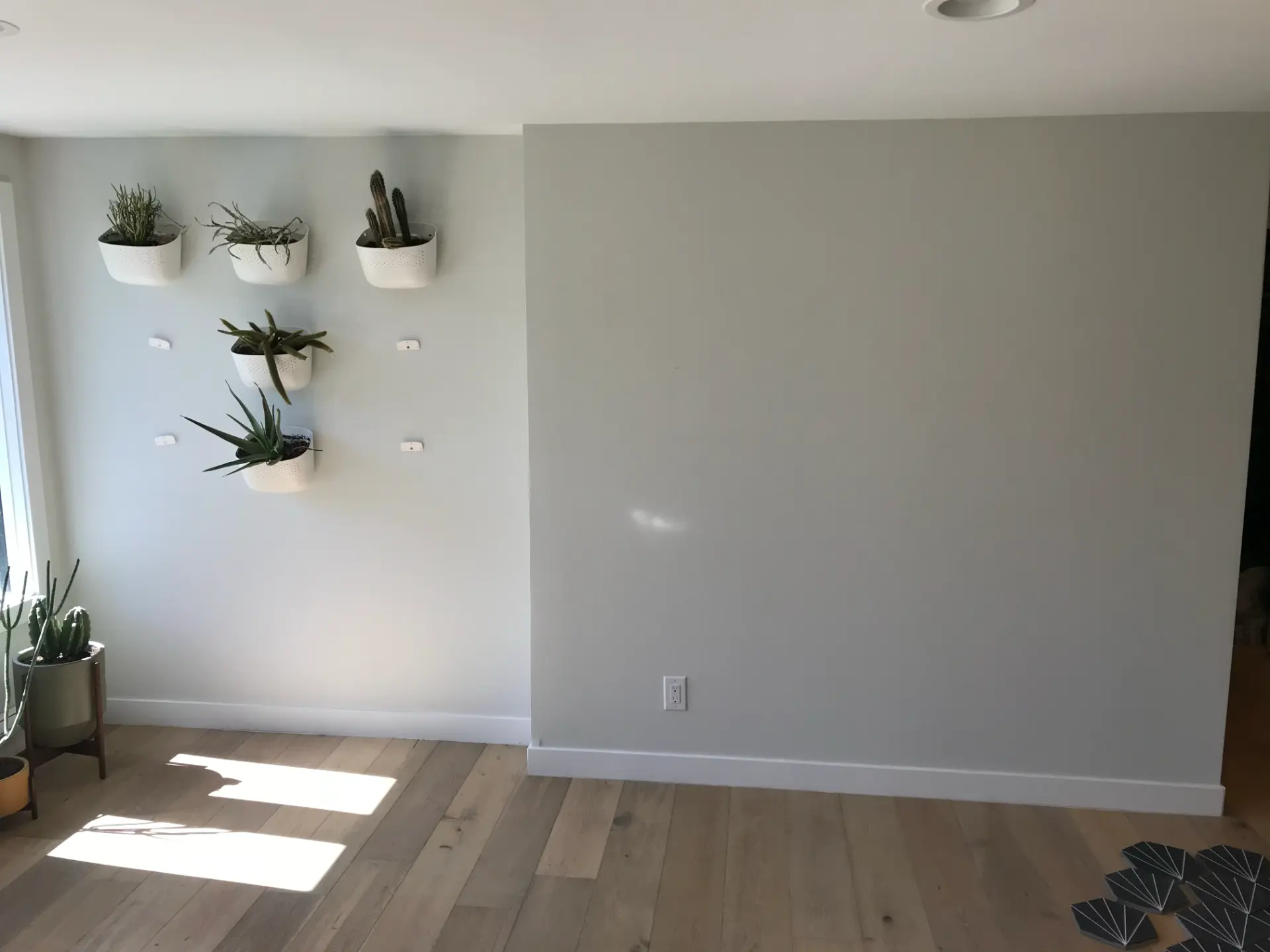 Unfinished living room wall before JR Burcham fireplace and built-in remodel